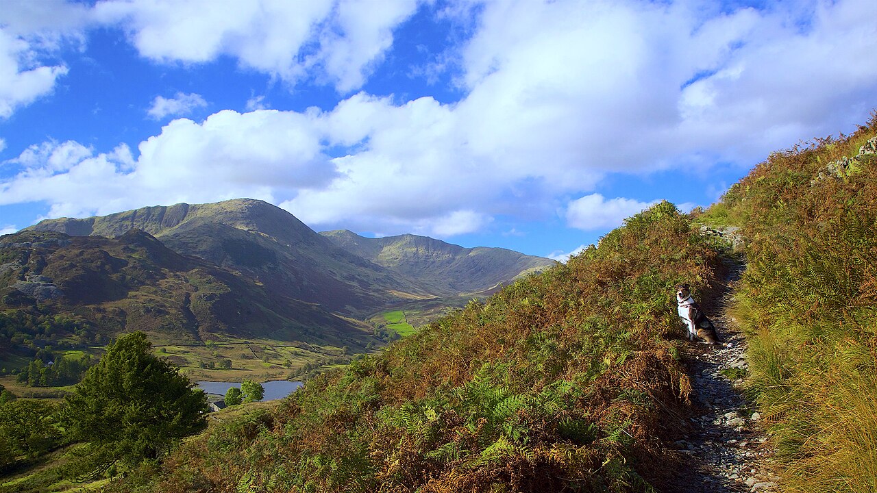 The Langdale Pikes, rocky fell tops in the Lake District under a wide sky