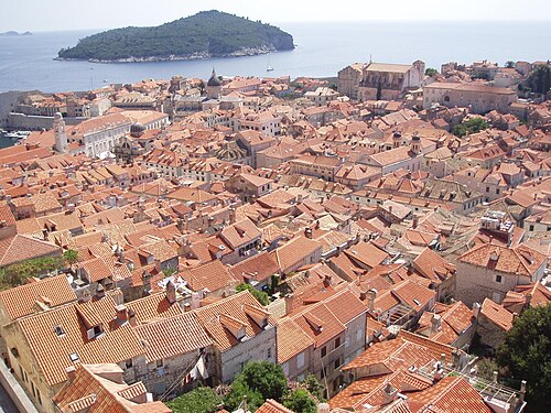 The terracotta roofs of Dubrovnik's old town and the Adriatic, seen from the city walls