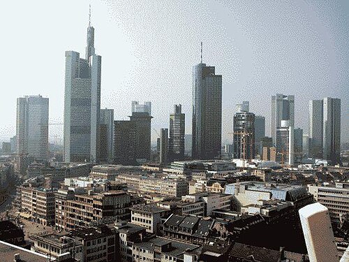The Frankfurt skyline of glass towers seen across the River Main
