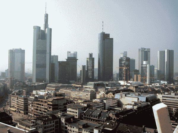 The Frankfurt skyline of glass towers seen across the River Main