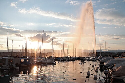 The Jet d'eau fountain rising from Lake Geneva