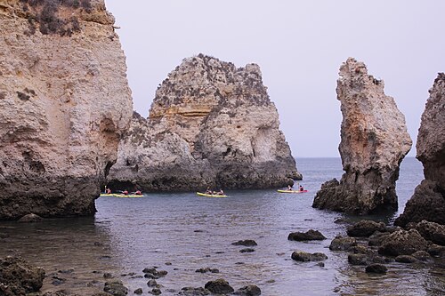 The golden limestone cliffs and sea stacks of Ponta da Piedade near Lagos in the Algarve