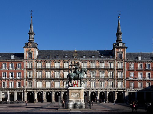 The Plaza Mayor in Madrid, with Philip III on horseback before the painted Casa de la Panadería