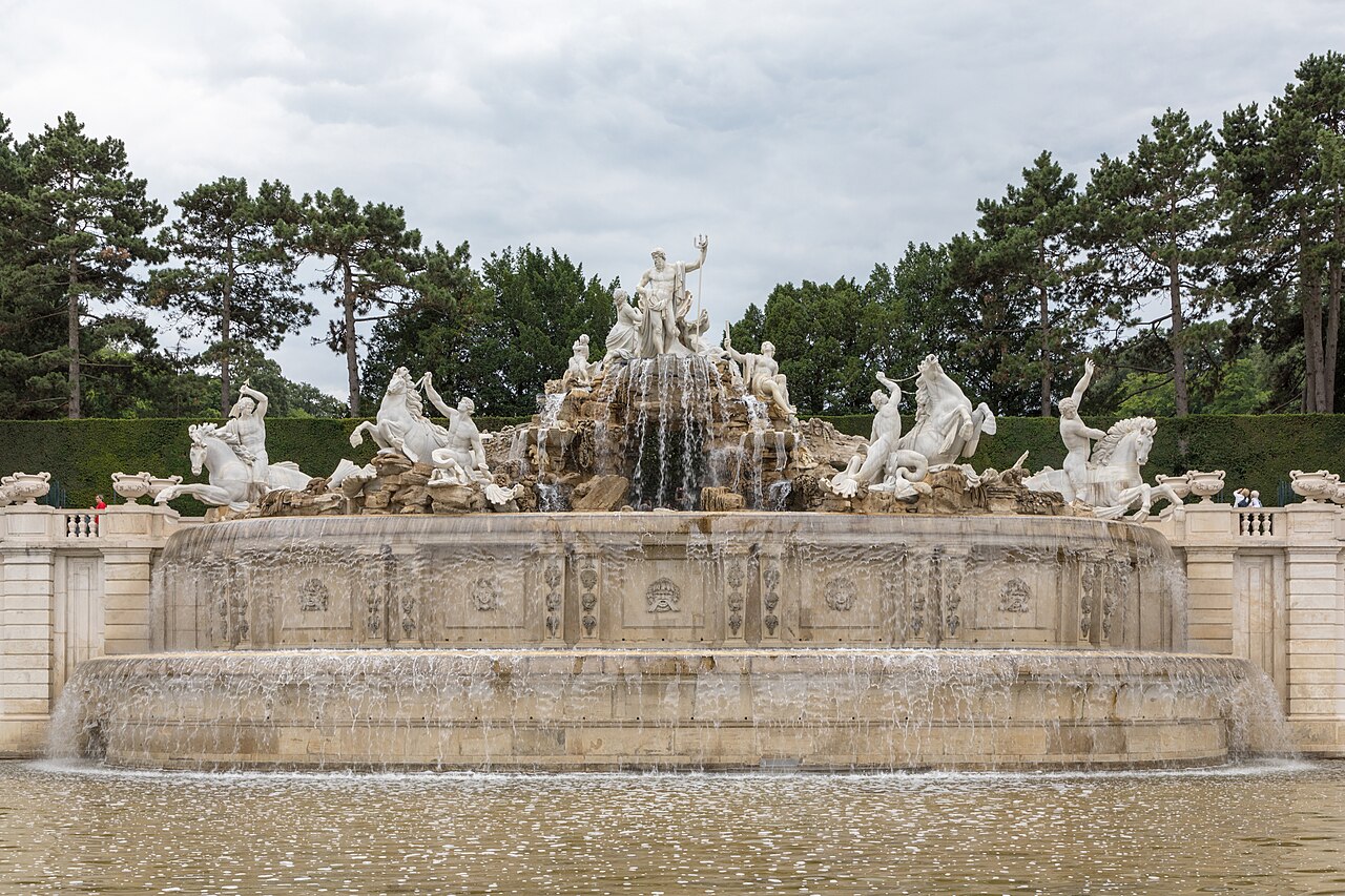 The Neptune fountain in the gardens of Schönbrunn Palace in Vienna