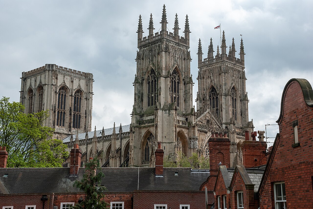York Minster rising above the roofs, seen from the medieval city walls