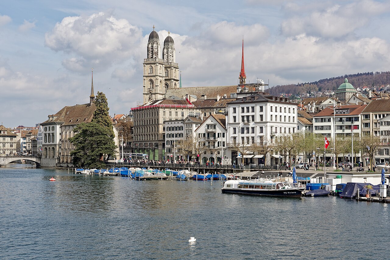 The twin towers of the Grossmünster rising over the Limmat river in Zurich